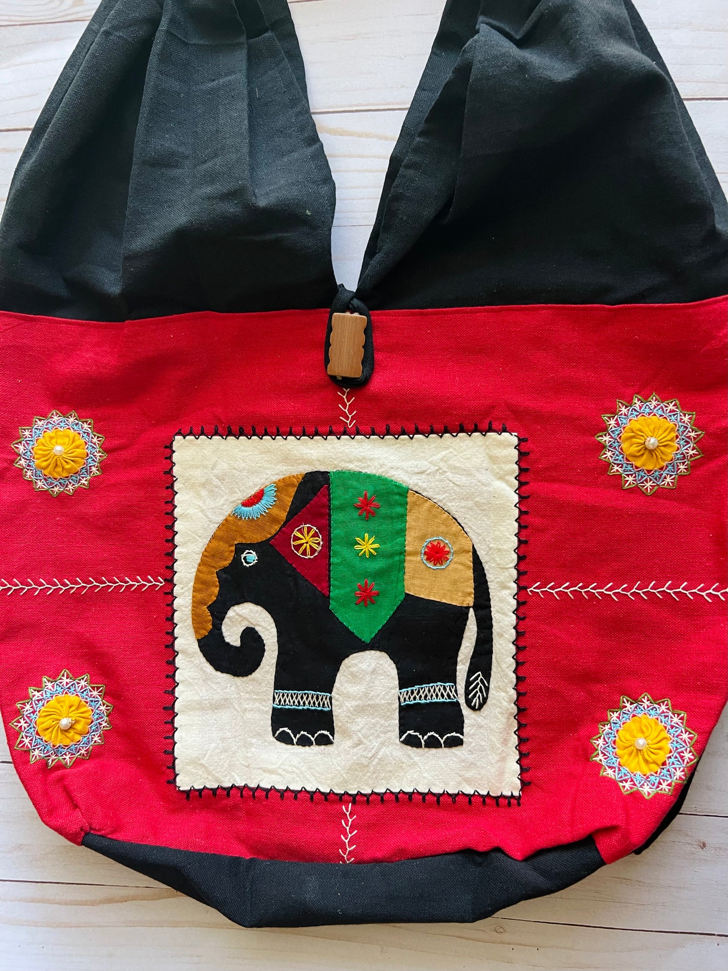 Hand embroidered handloom handbag