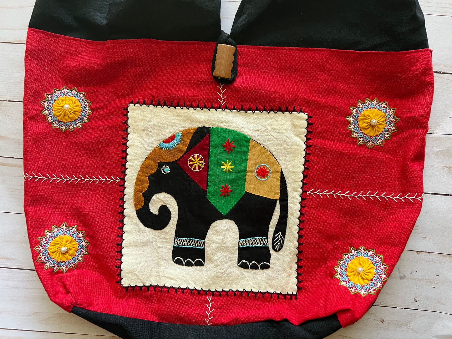 Hand embroidered handloom handbag